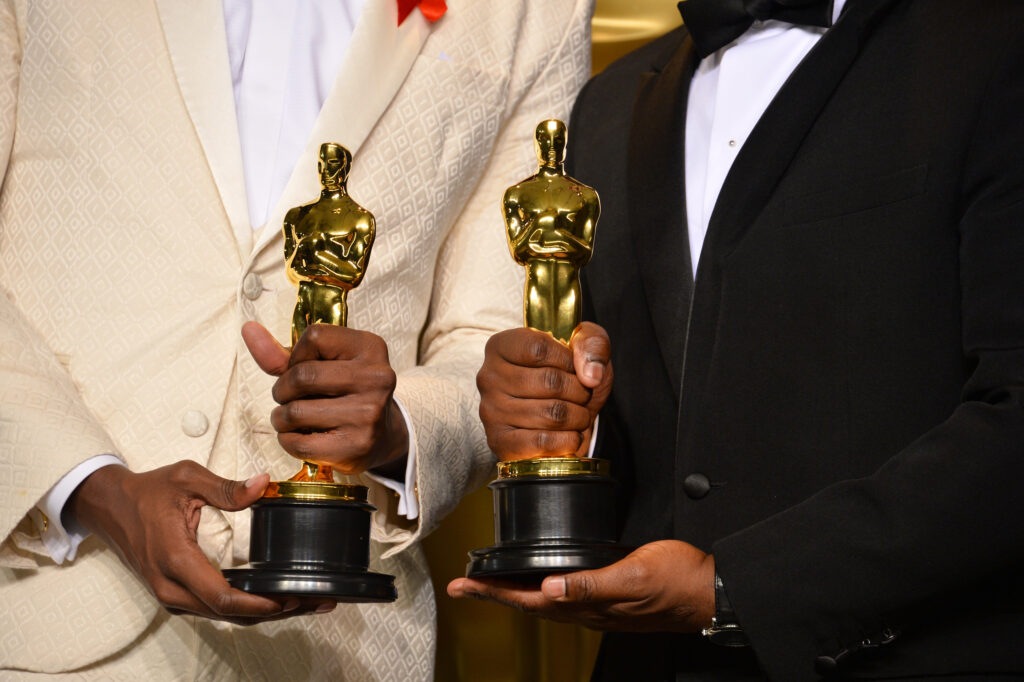 Actors-holding-Oscars-Photo-by-Jaguar-PS-on-Shutterstock-