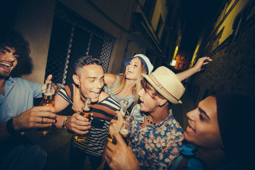 Group Of Teenager Friends Partying Together In Street. Image: canadianunderwriter.ca