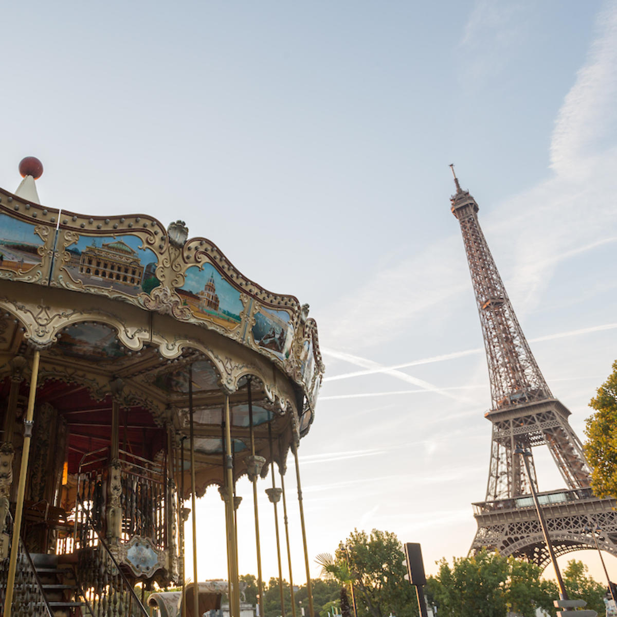 low angle view of merry-go-round and Eiffel tower at sunset