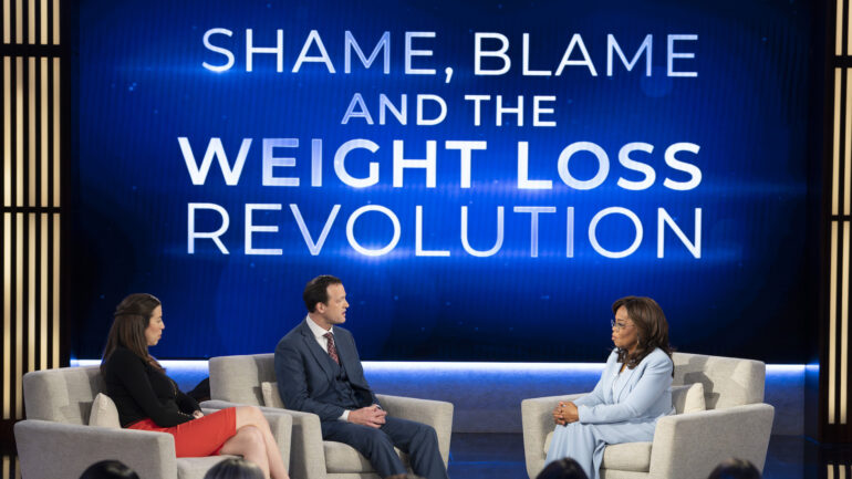 Oprah Winfrey interviewing medical professionals about obesity during her ABC special "Shame, Blame, and the Weight Loss Revolution"