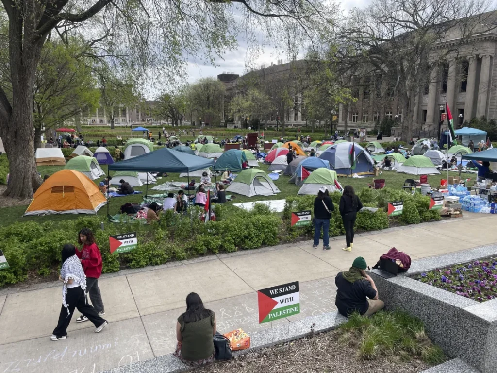 Dozens of tents and people are photographed on day two of an encampment in support of Palestinians at the University of Minnesota's campus in Minneapolis, Minn., on Tuesday, April 30, 2024. Credit: Trisha Ahmed/APUniversity