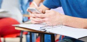 Student ignoring work from phone distraction / phone use in school