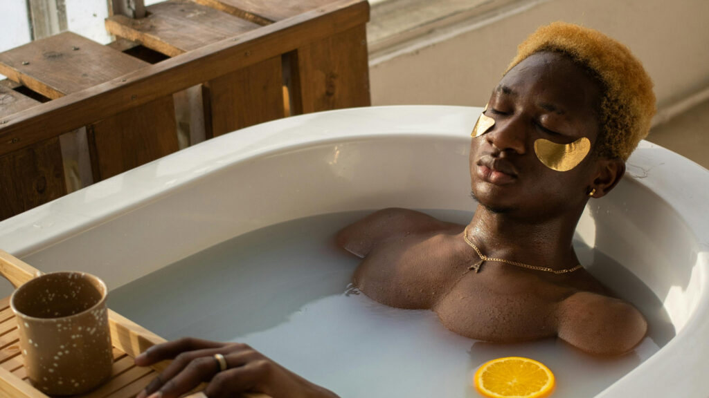 A man taking a bath as part of a story on health practices for men after 30. (Credit: Monstera Production via Pexels)