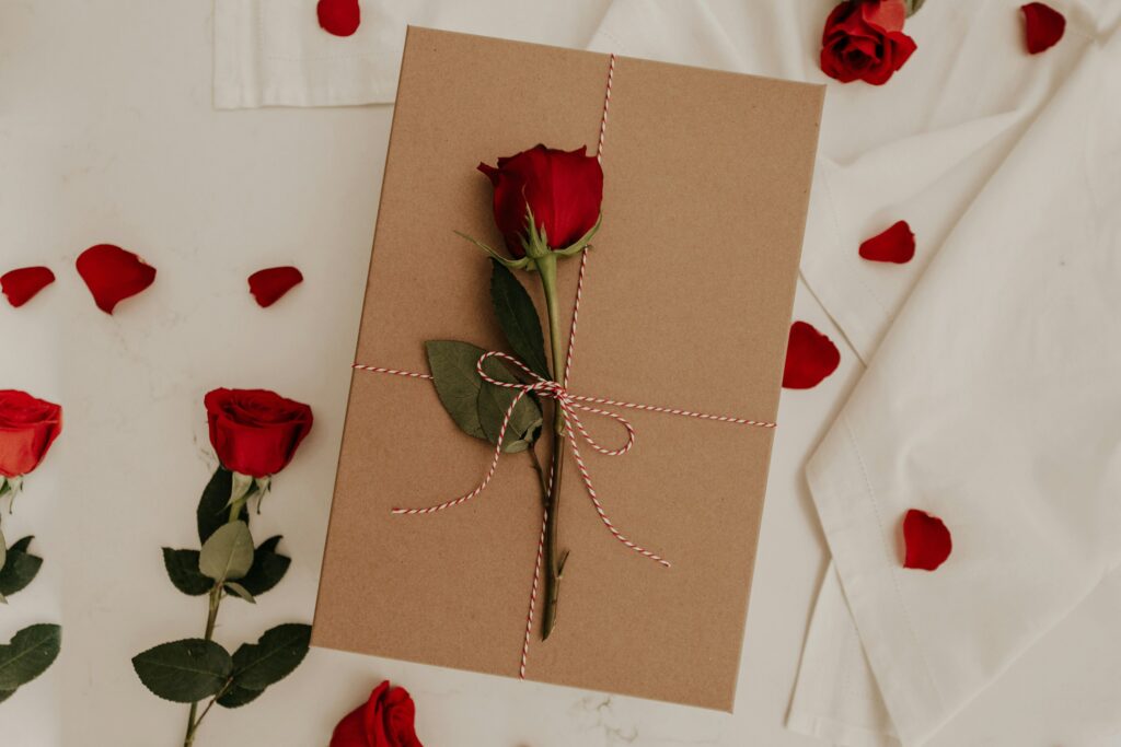 Roses and rose petals as part of a guide on Valentine's Day gifts for men. (Credit: Becca Tapert via Unsplash)