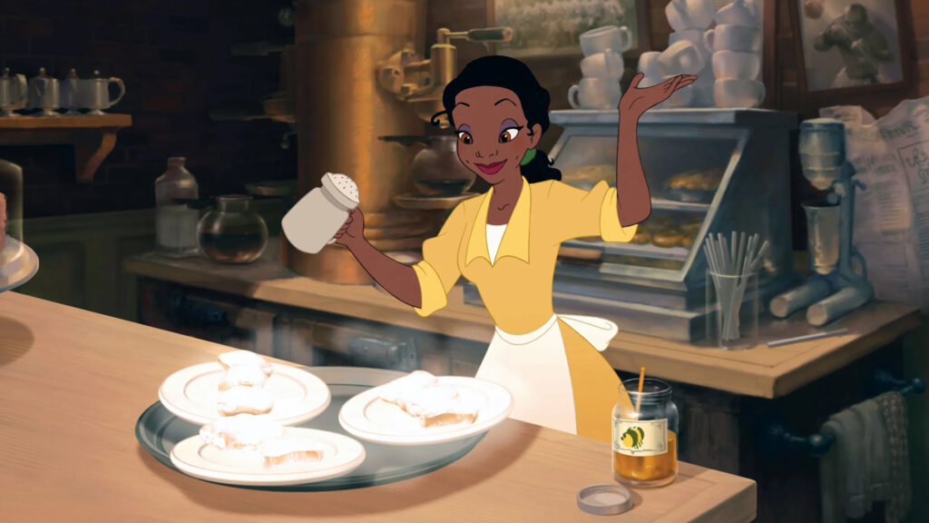 A still of Princess Tiana cooking as part of a story on analog hobbies to try this spring. (Credit: © Walt Disney Co.)