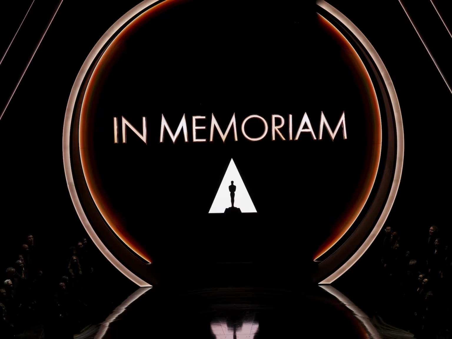 Oscars In Memoriam graphic as part of a story explaining the annual award show segment. (Credit: Rich Polk/Penske Media via Getty Images)