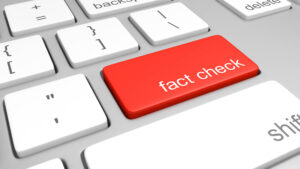 Key on a computer keyboard for fact checking statements