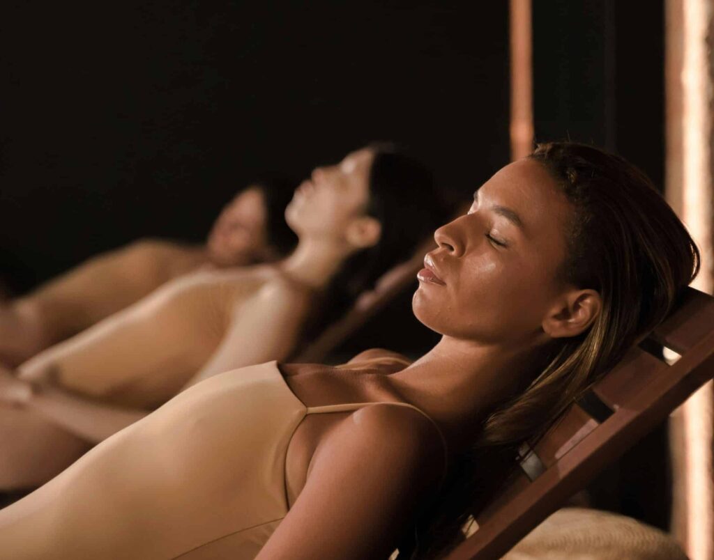 Women at a wellness spa as part of a story on wellness becoming a third space. (Credit: Ron Lach via Pexels)