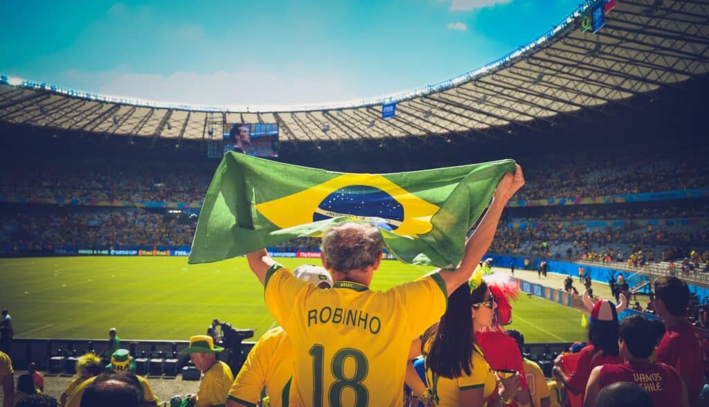 A football fan rooting for a Brazilian team as part of a FIFA World Cup story. (Credit: Pexels / Pixabay)